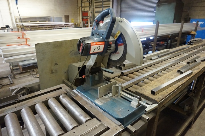 Bosch GC02000 Pull Down Saw with Infeed/Outfeed Roller Conveyor