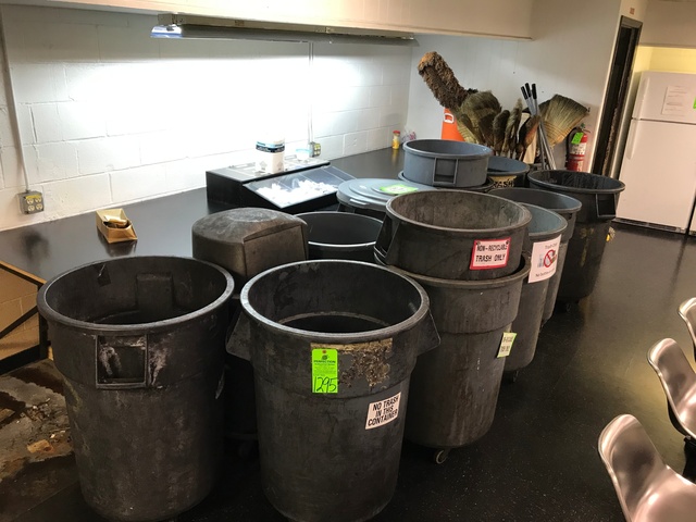 Lot of Garbage Cans and Brooms