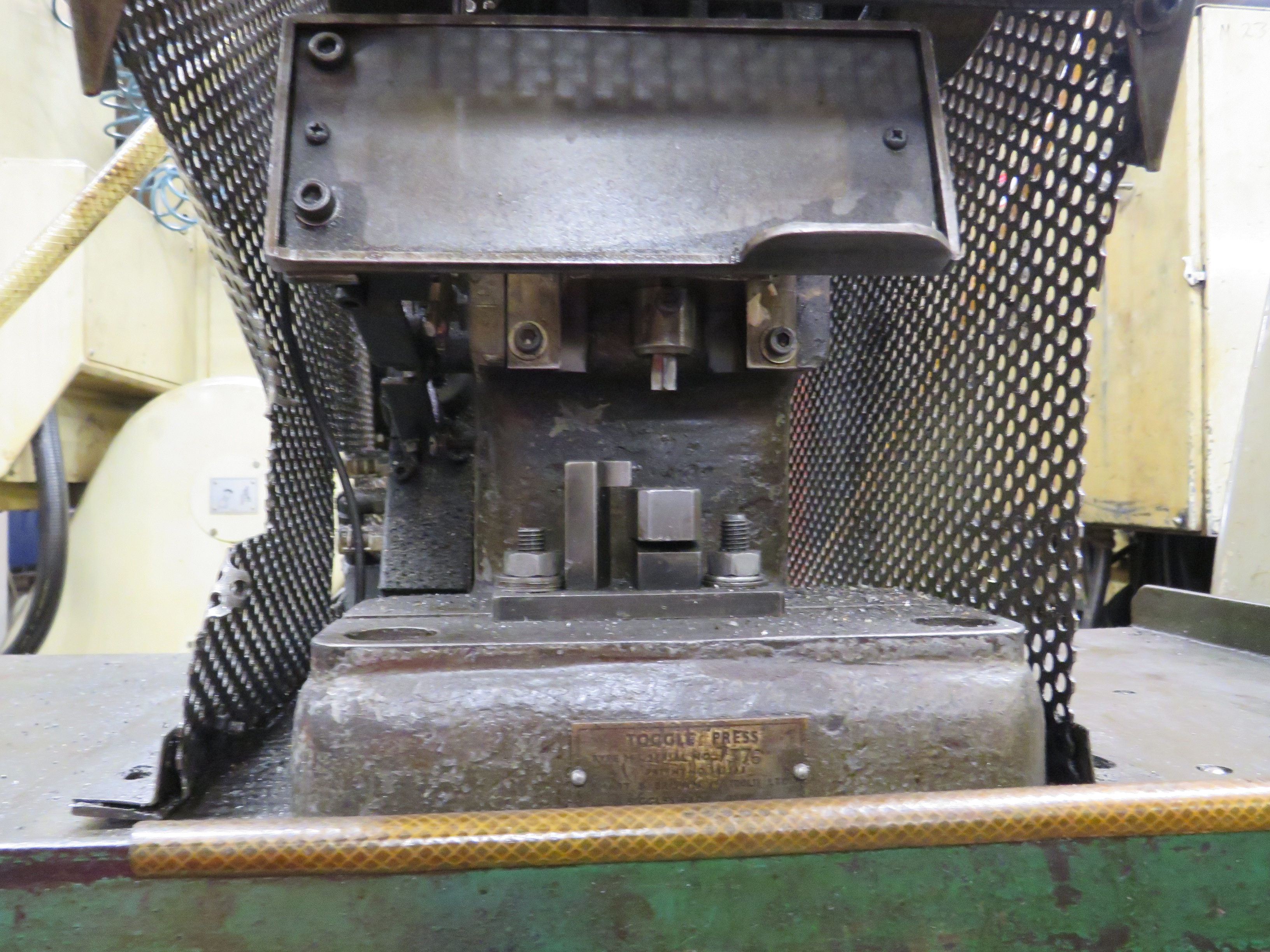 Toggle Press
