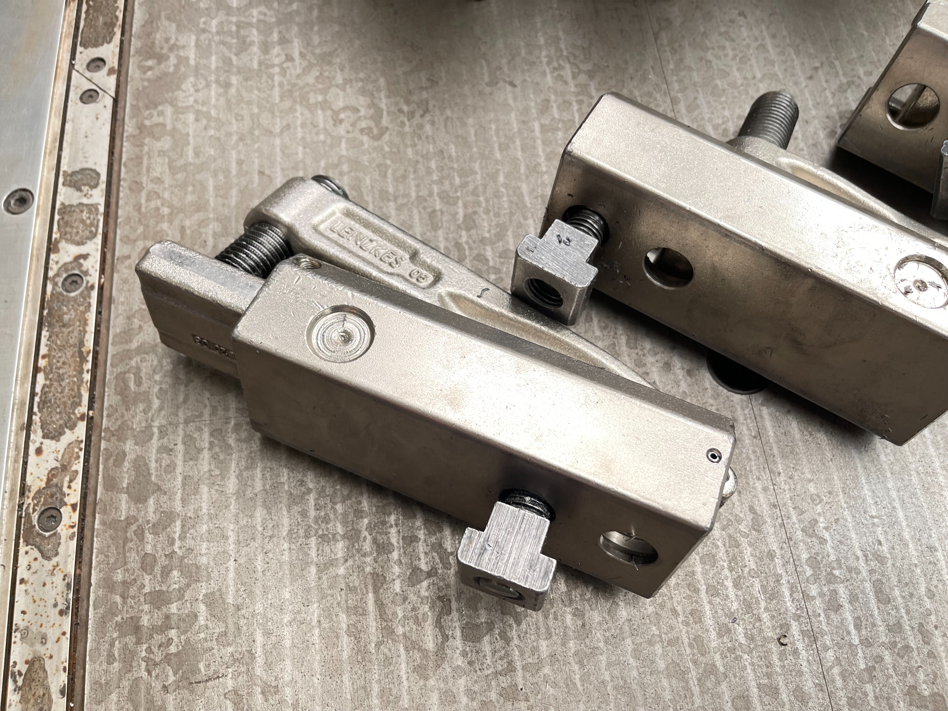 Qty of Lenzkes Clamps and Riser Blocks