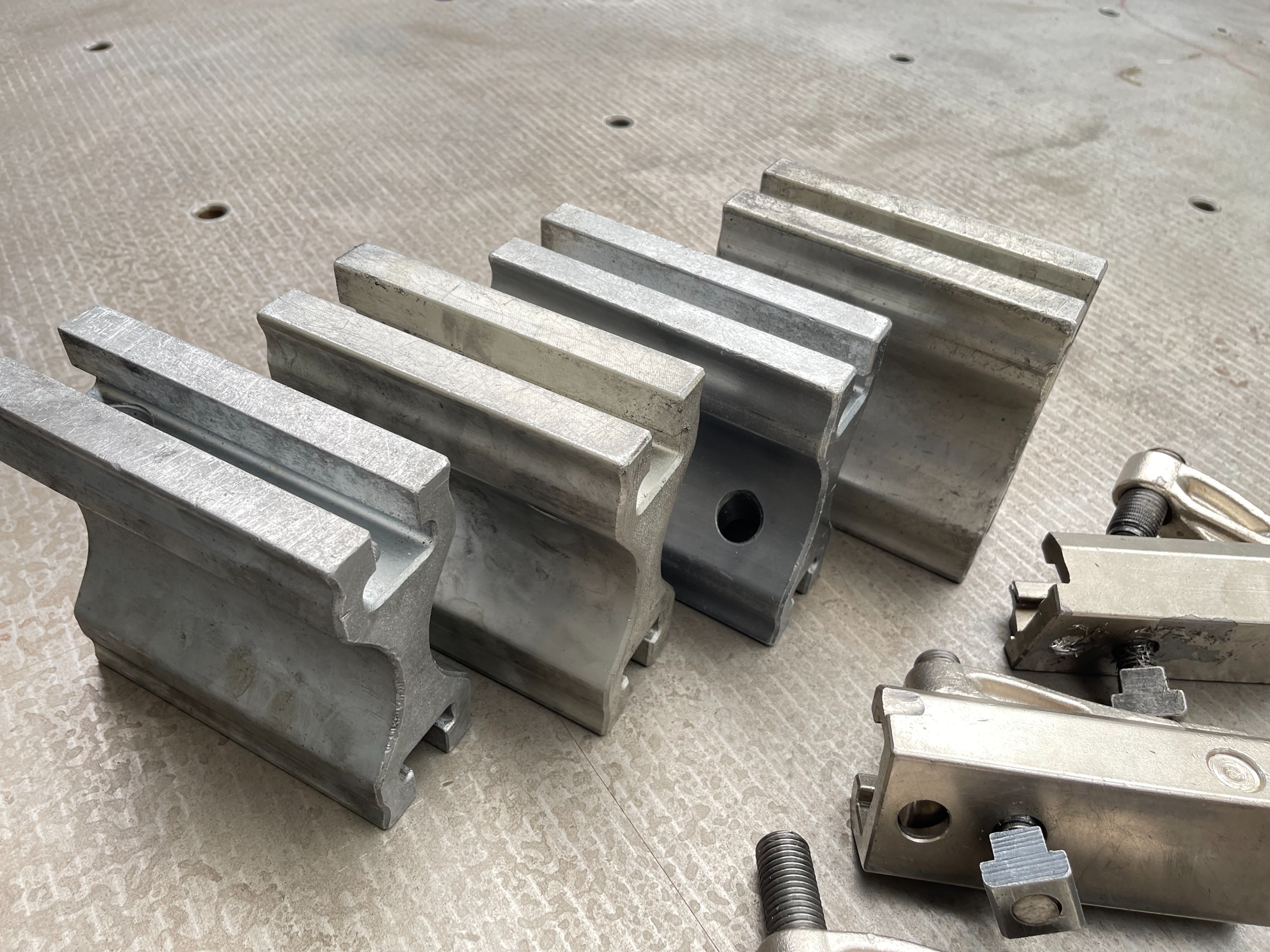 Qty of Lenzkes Clamps and Riser Blocks