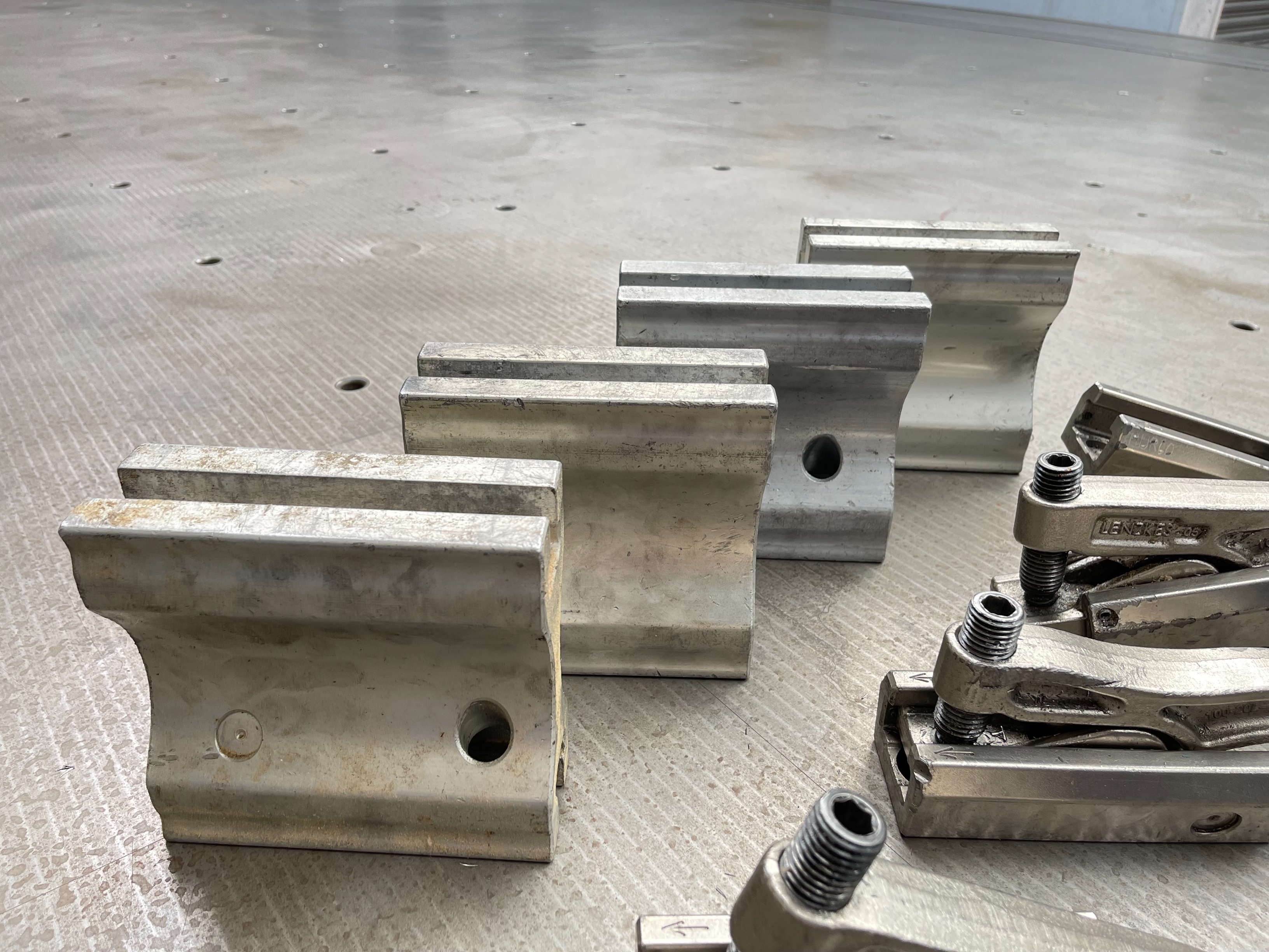 Qty of Lenzkes Clamps and Riser Blocks