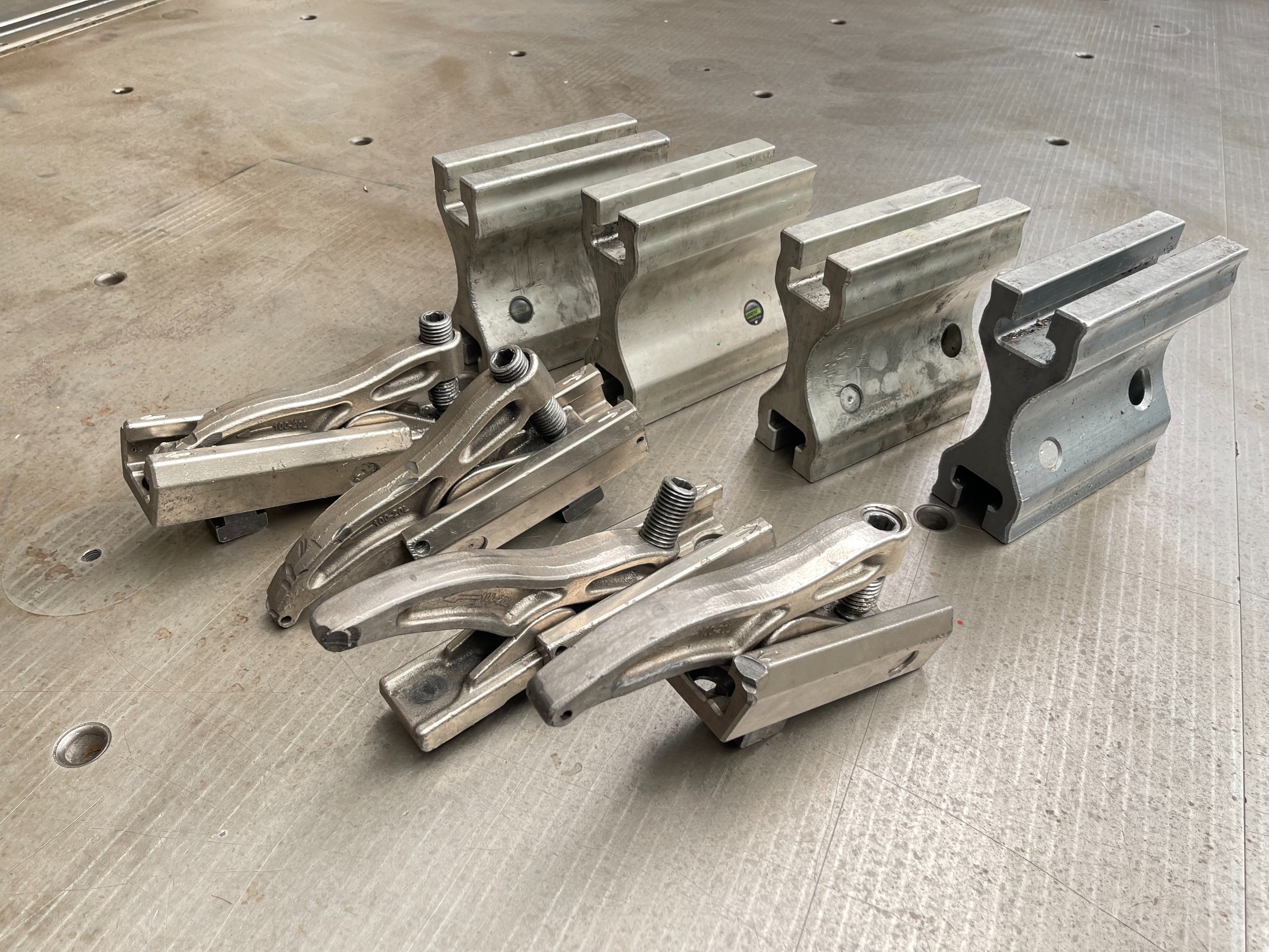 Qty of Lenzkes Clamps and Riser Blocks