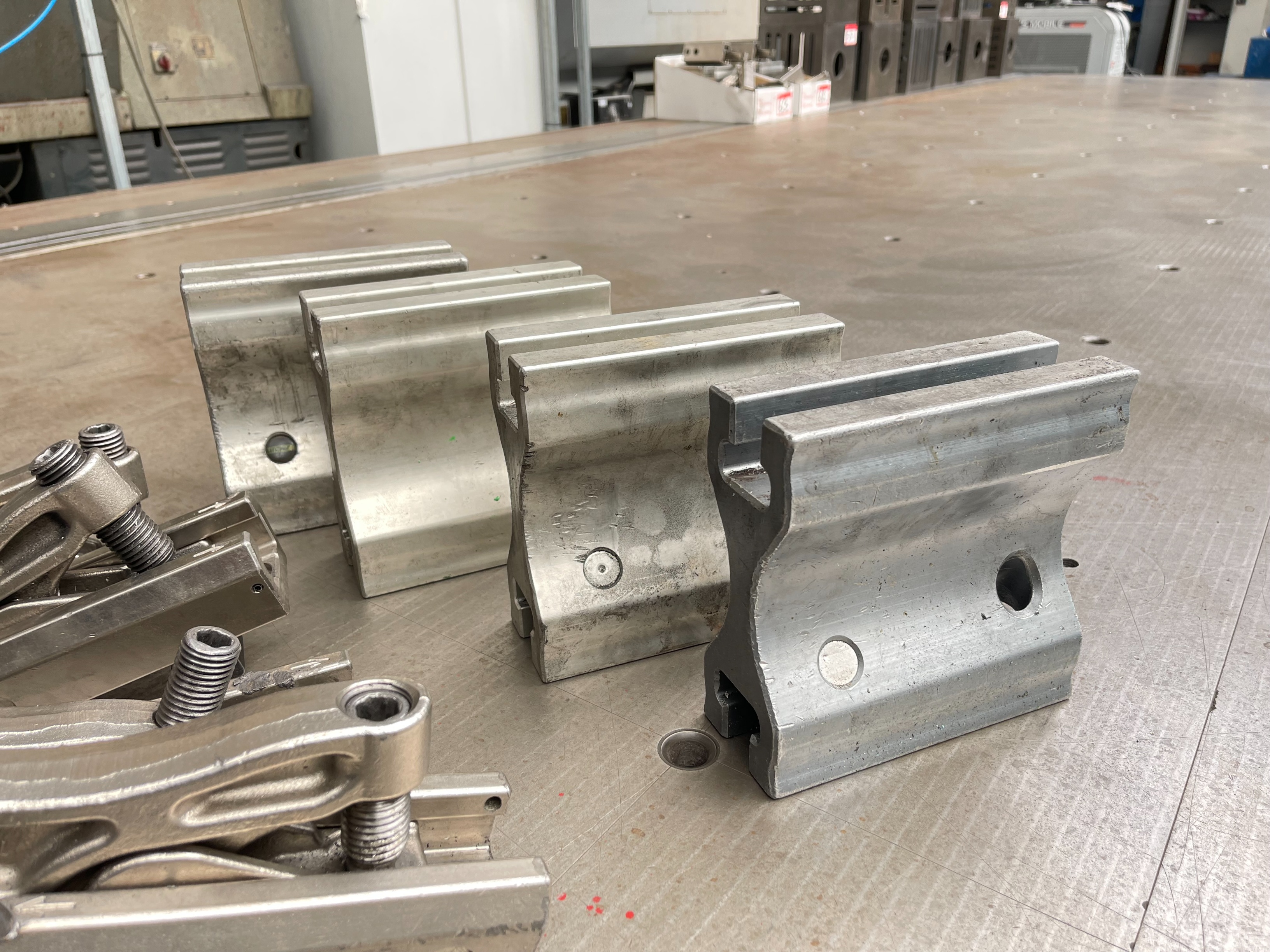 Qty of Lenzkes Clamps and Riser Blocks