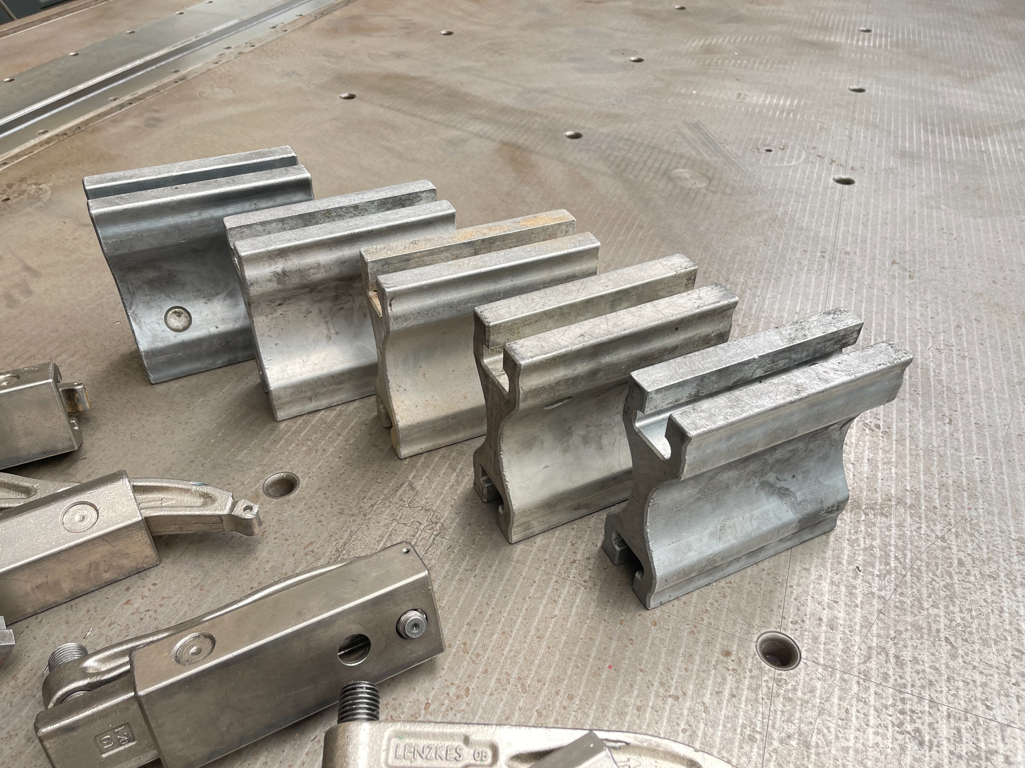 Qty of Lenzkes Clamps and Riser Blocks
