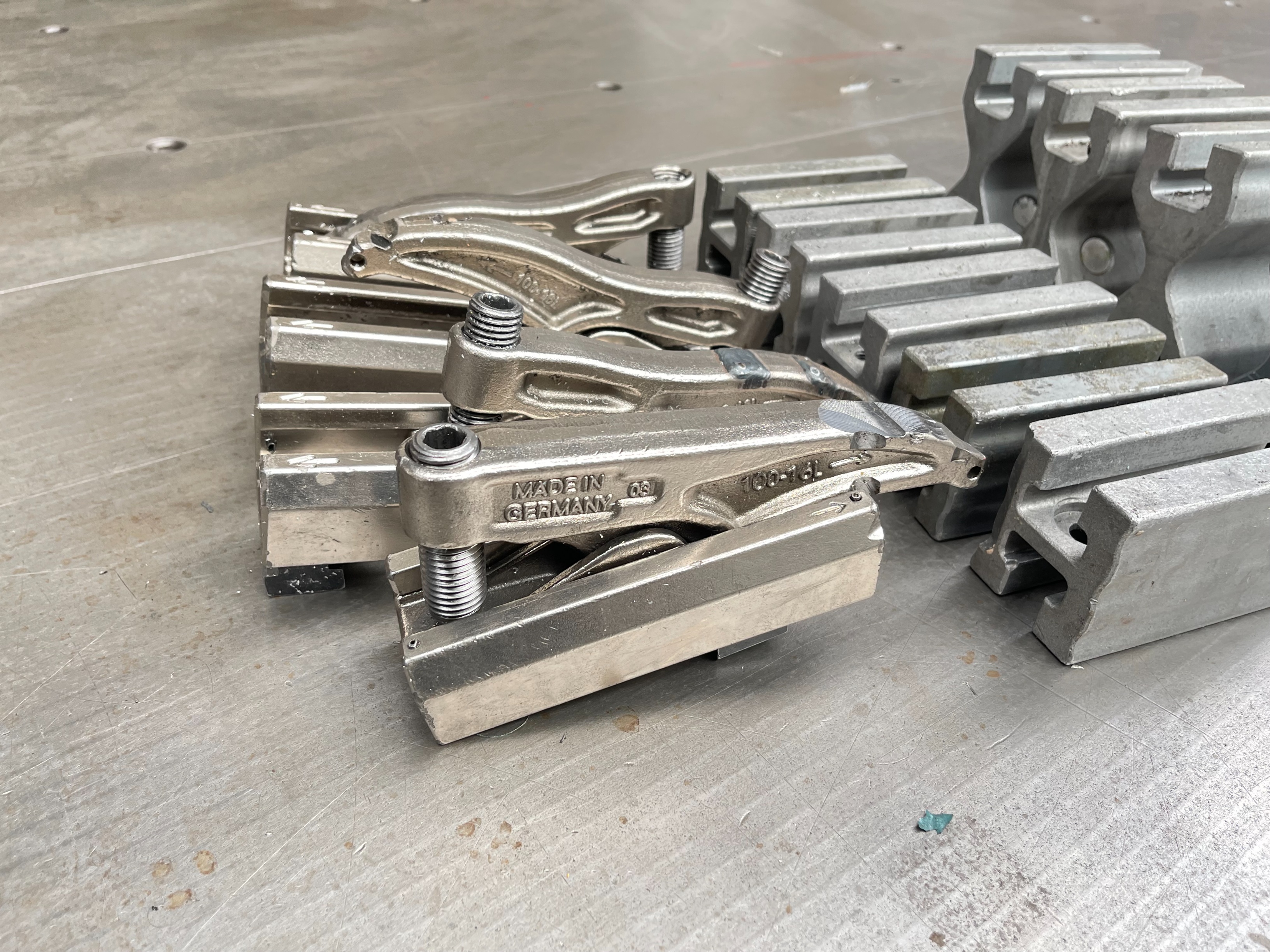 Qty of Lenzkes Clamps and Riser Blocks