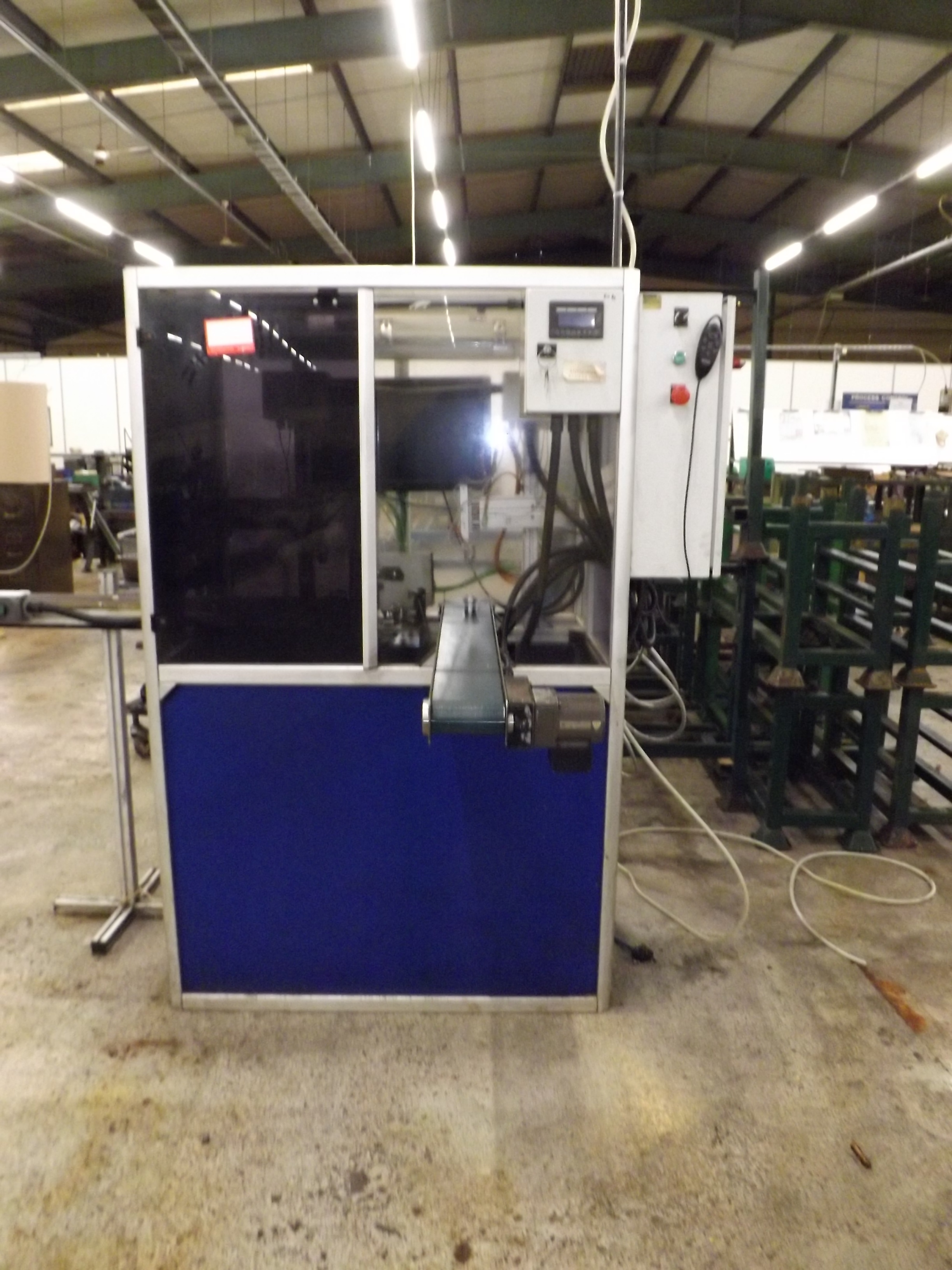 Parts Checker Conveyor feed/ exit machine