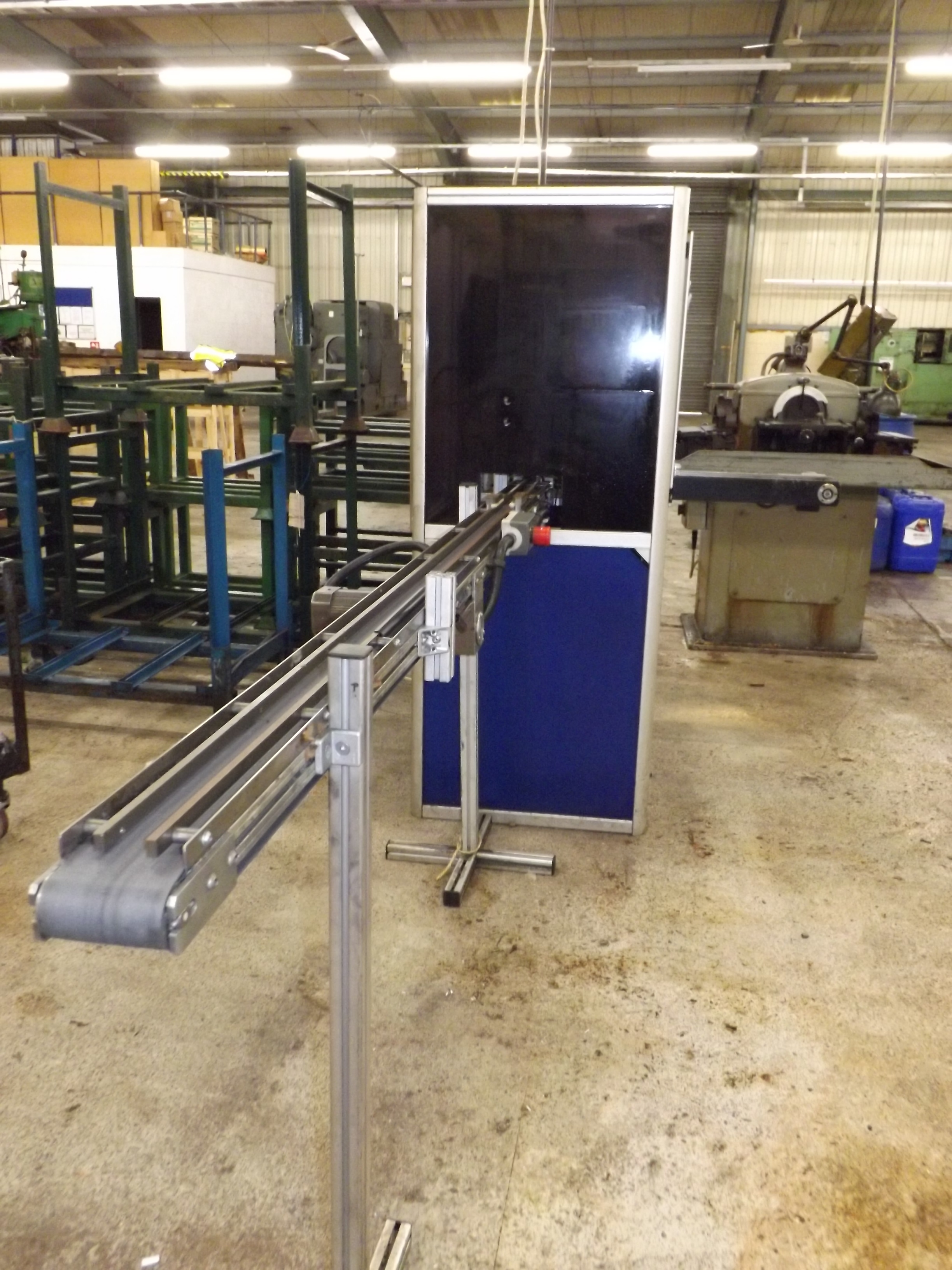 Parts Checker Conveyor feed/ exit machine