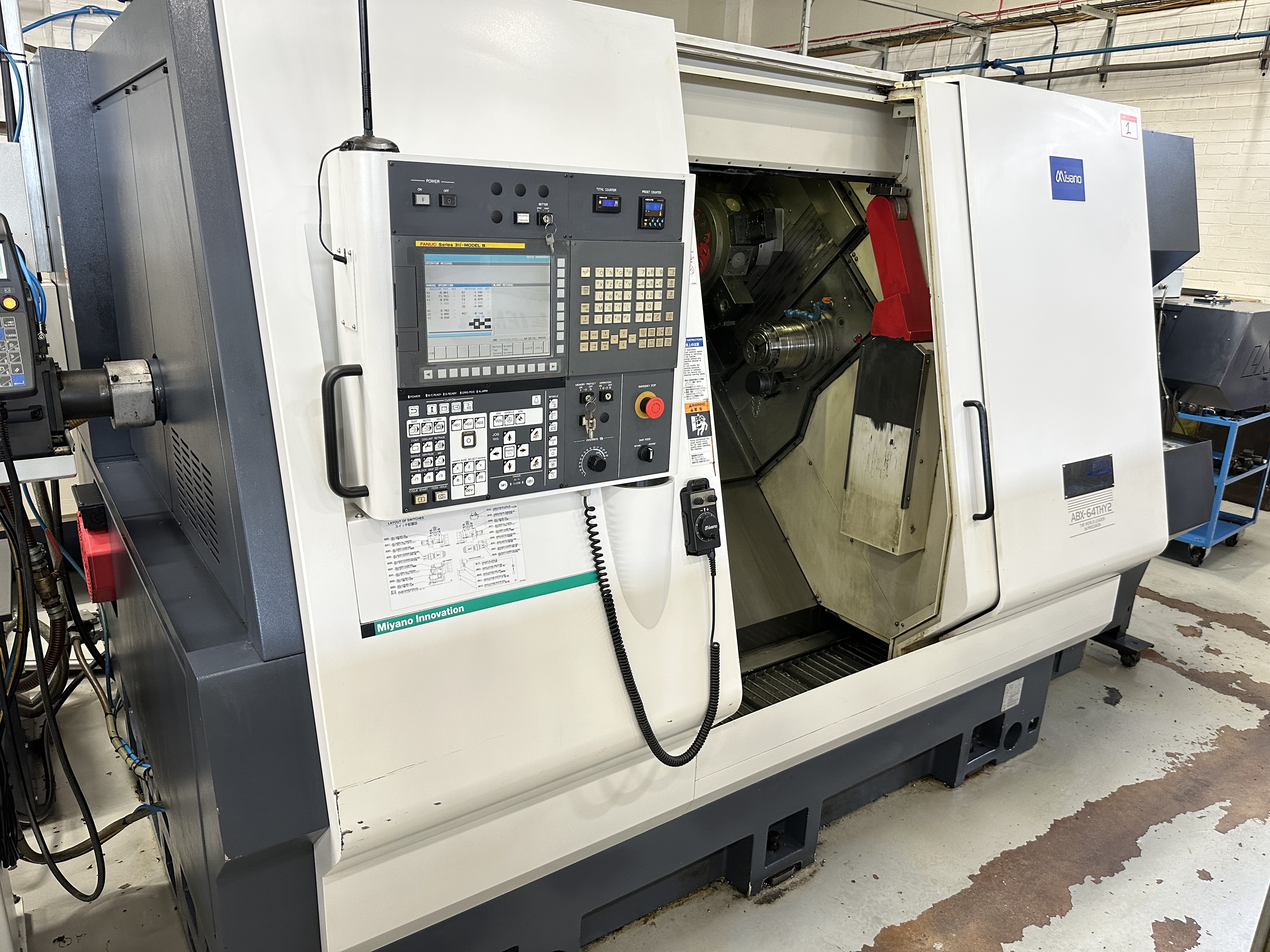 Miyano ABX-64THY2 Twin Spindle Fixed Head Stock Lathe with Fanuc Series 31i Model B CNC Control (2014)