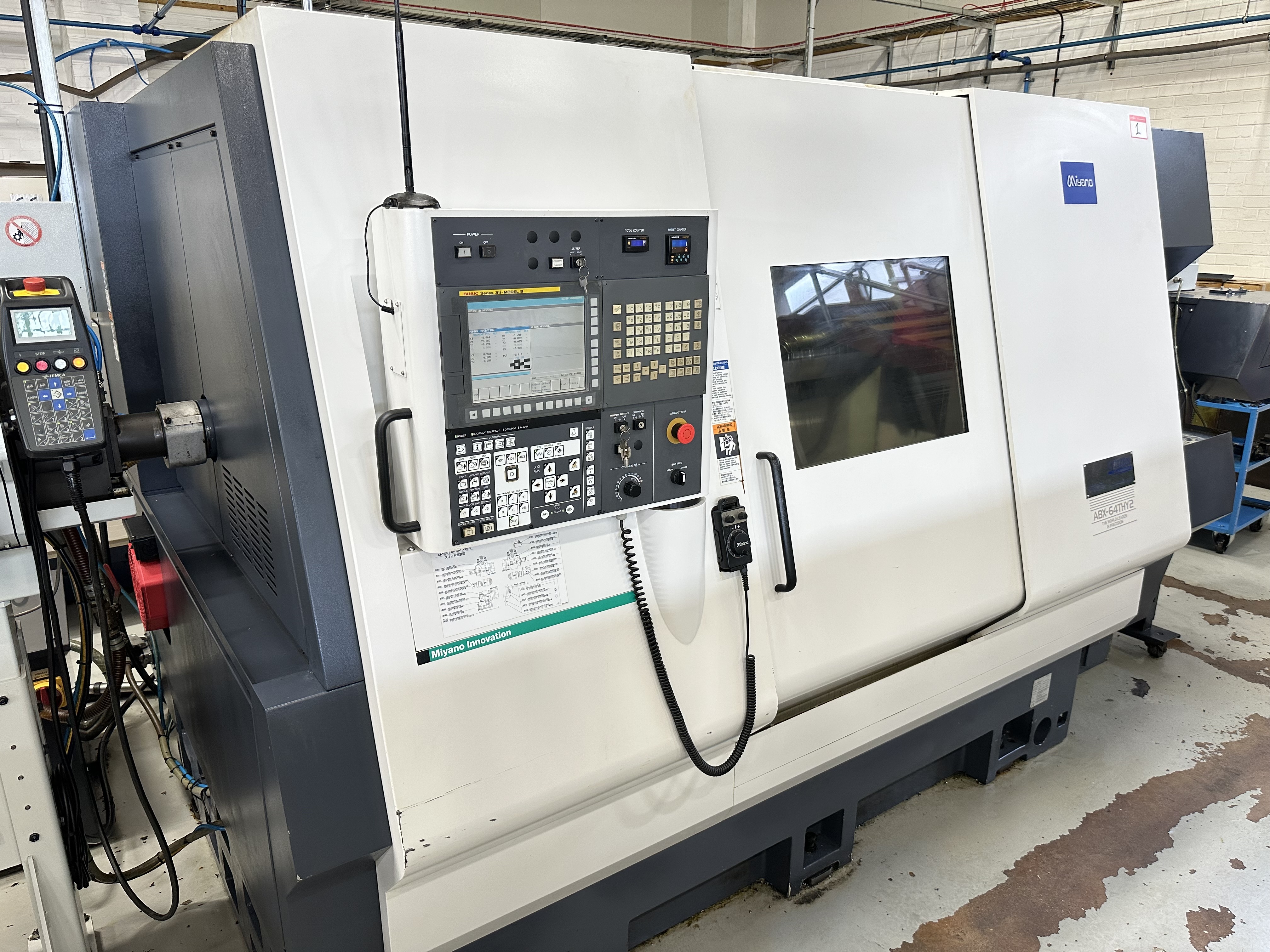 Miyano ABX-64THY2 Twin Spindle Fixed Head Stock Lathe with Fanuc Series 31i Model B CNC Control (2014)