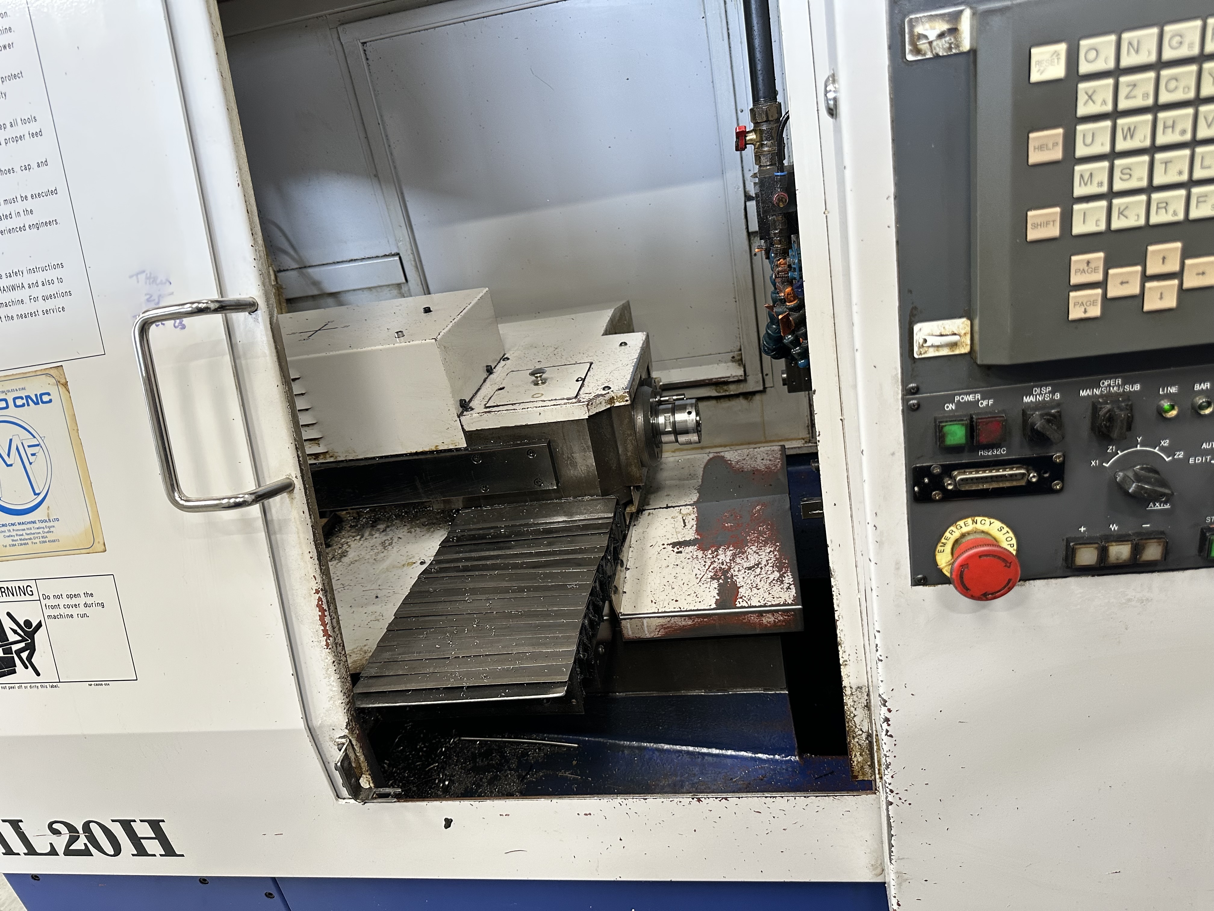 Hanwha ML20H Sliding Head Lathe 6 Axis with Fanuc Series18i-T CNC Control (2001)