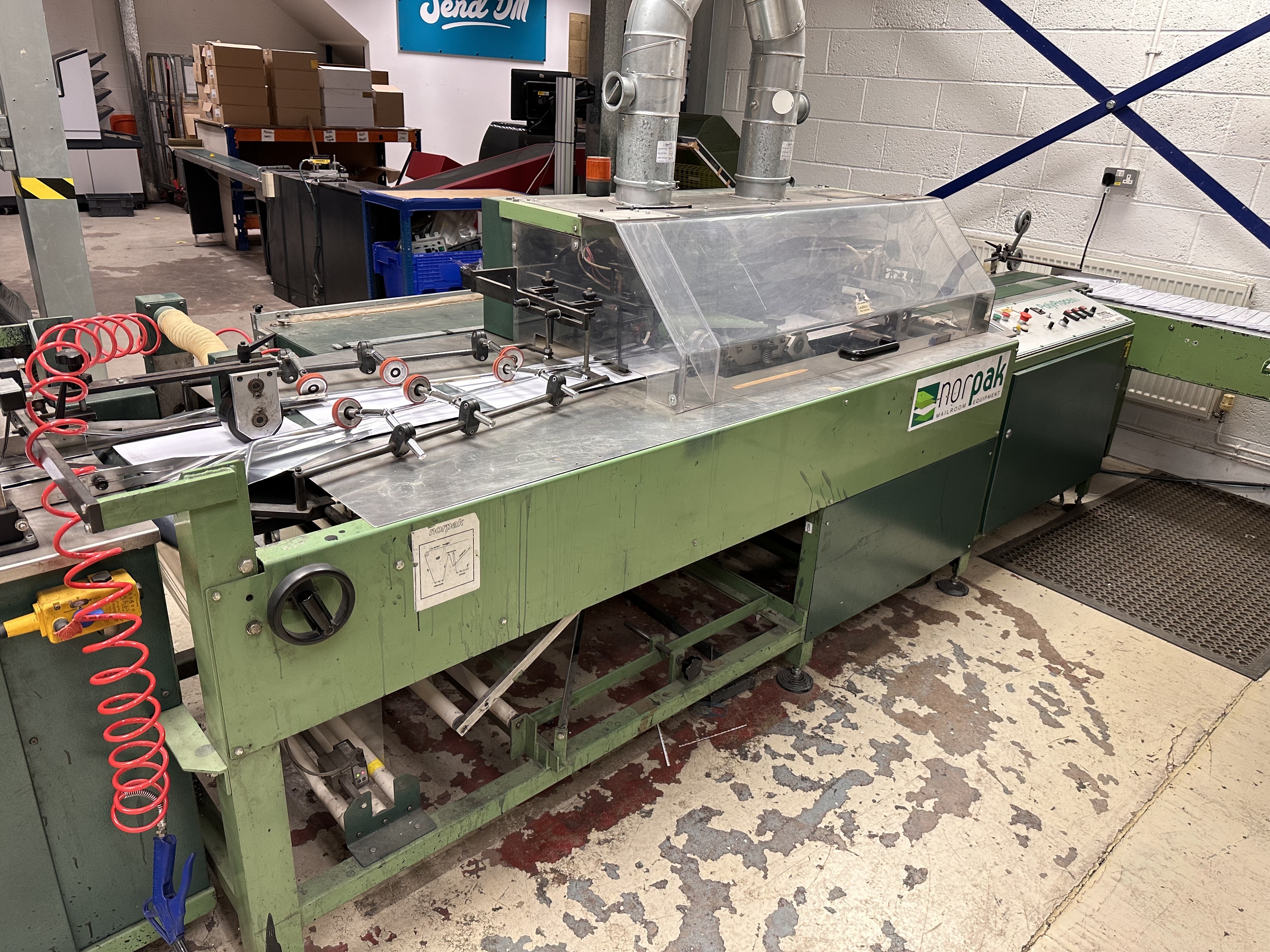 Norpak Magazine Sorting and Polywrapping Line