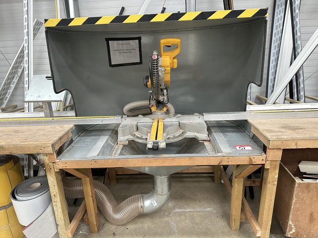 Dewalt DWS 780 mitre saw with twin bag extractor