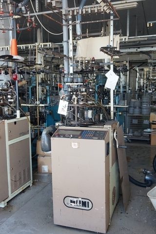 Rumi RGAR Hosiery Knitting Machine; 216 Needle Count; 54 Gauge