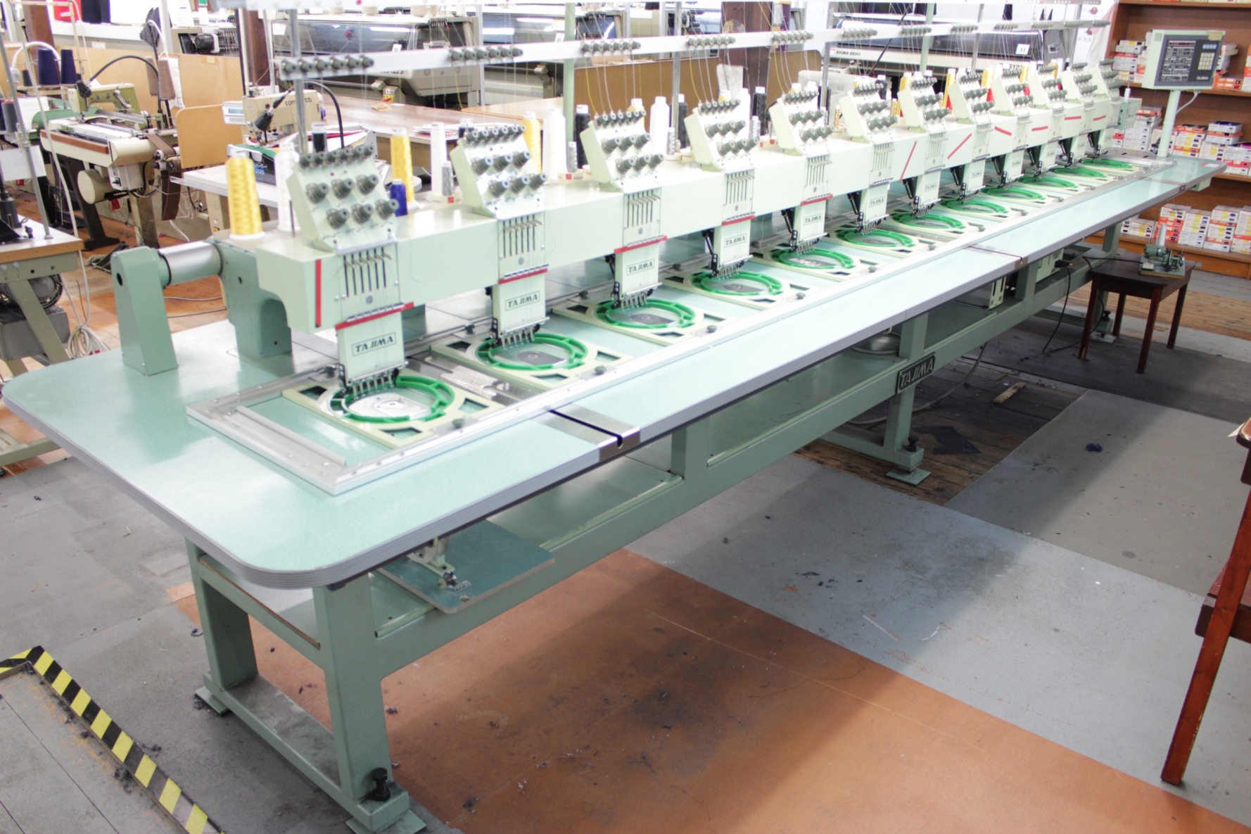 Tajima TMEH612 Electronic 12 Head 6 Colour Automatic Embroidery Machine