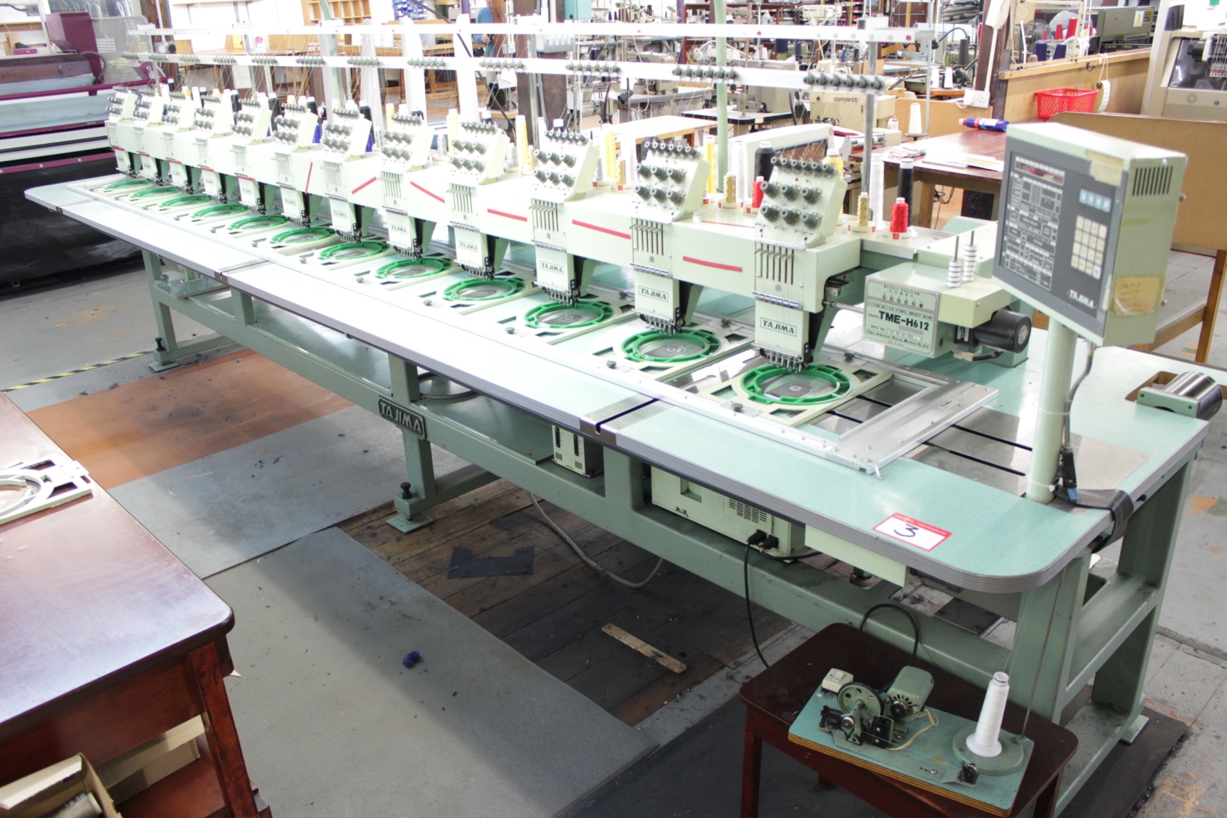 Tajima TMEH612 Electronic 12 Head 6 Colour Automatic Embroidery Machine